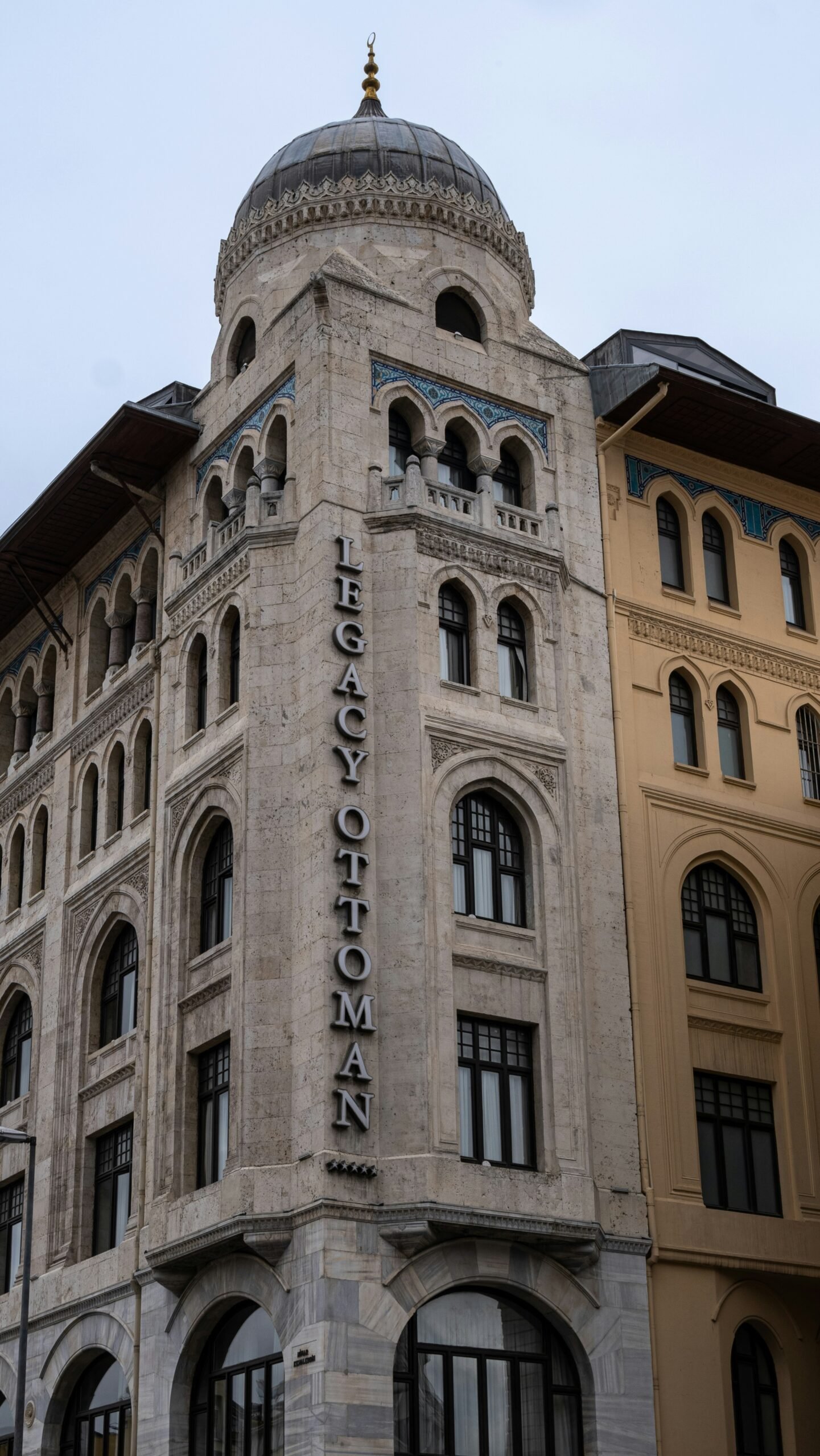 a tall building with a dome on top of it