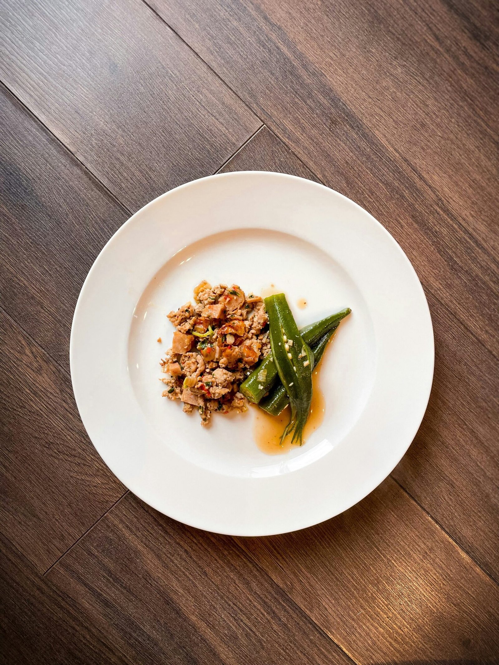 green vegetable on white ceramic plate